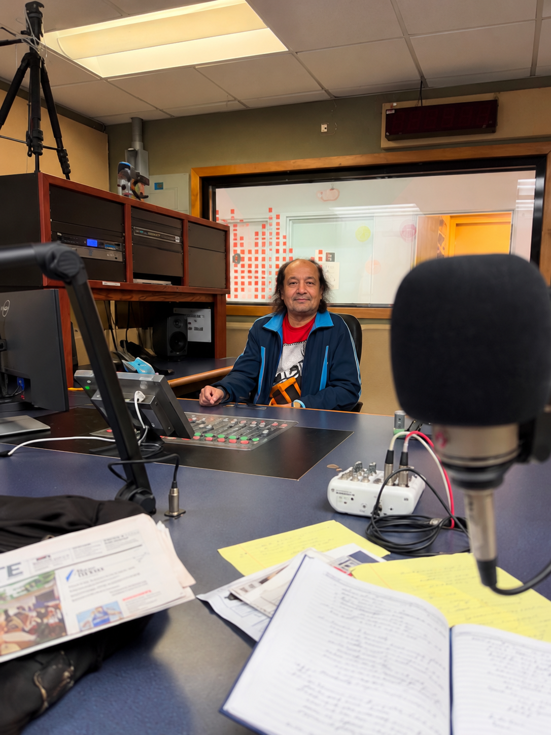 Jorge González with the new WIPR technician in the radio studio